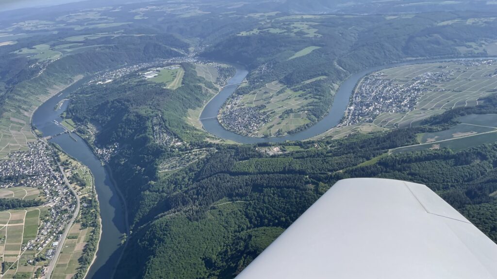 impterssing landscape on the mosel river, short before landing approach to 'Traben-Trarbach - Mount royal', shown as a light green grass strip