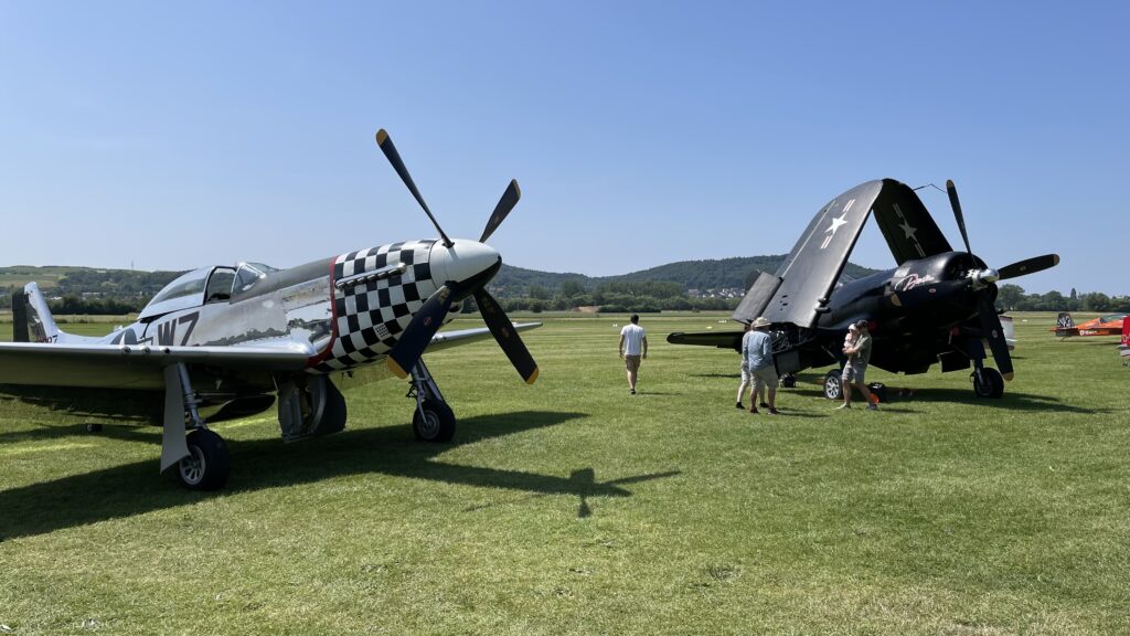 aerobatics and static display with famous warbirds at airshow 'Flugplatzkerb' at airfield Gelnhausen